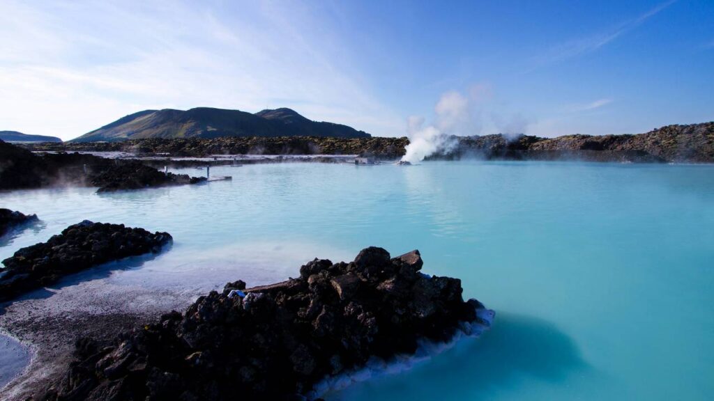 A view of Blue Lagoon Iceland, with blue waters and steam