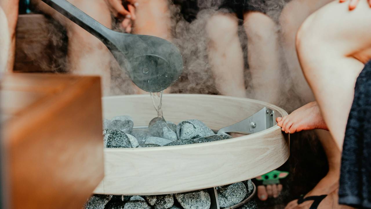 A photo of several people enjoying their time in the sauna